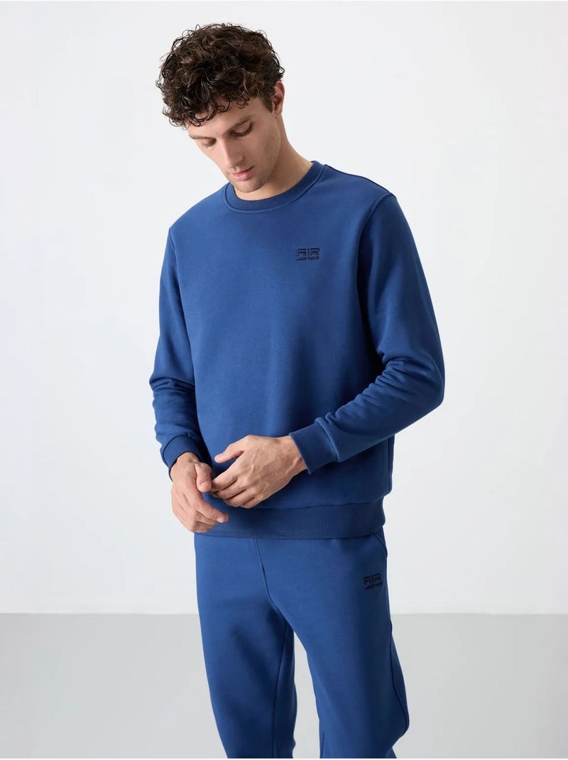Conjunto de homem de sweatshirt e calças em felpa de algodão e poliéster tommy Azul - Kiabi