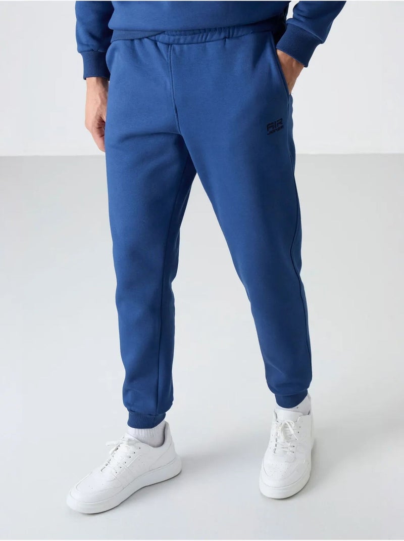Conjunto de homem de sweatshirt e calças em felpa de algodão e poliéster tommy Azul - Kiabi