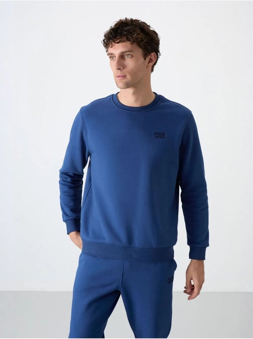 Conjunto de homem de sweatshirt e calças em felpa de algodão e poliéster tommy - Kiabi Conjunto de homem de sweatshirt e calças em felpa de algodão e poliéster tommy - Kiabi