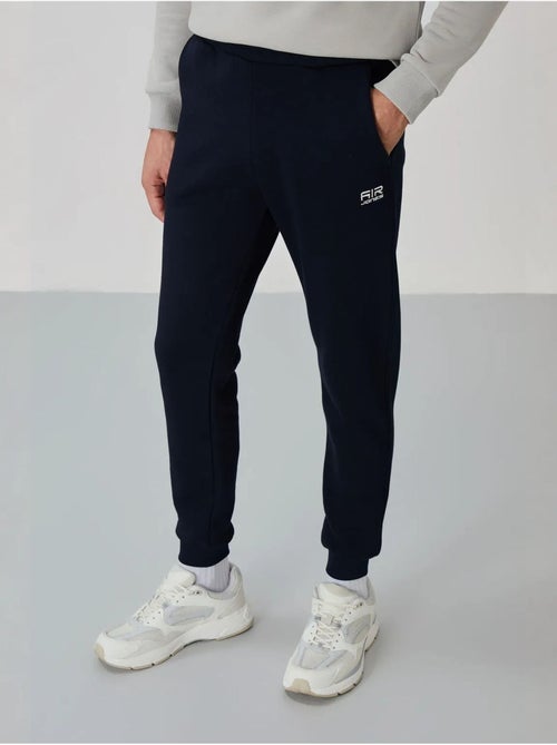 Conjunto de homem de sweatshirt e calças em felpa de algodão e poliéster tommy - Kiabi Conjunto de homem de sweatshirt e calças em felpa de algodão e poliéster tommy - Kiabi