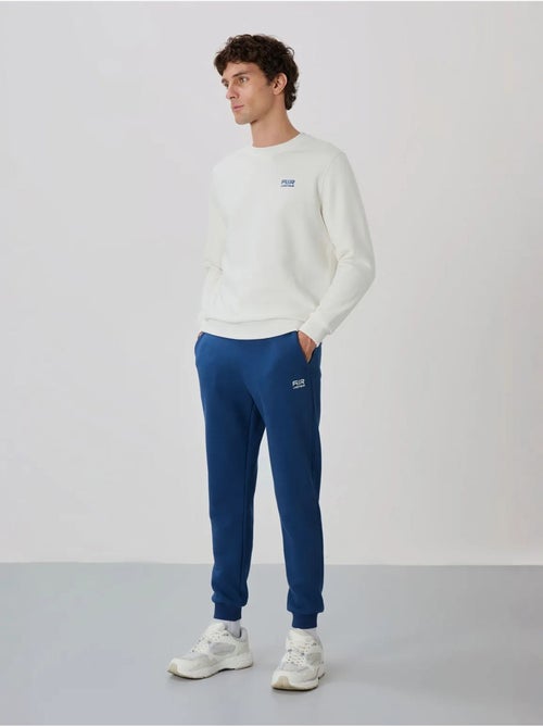 Conjunto de homem de sweatshirt e calças em felpa de algodão e poliéster tommy - Kiabi Conjunto de homem de sweatshirt e calças em felpa de algodão e poliéster tommy - Kiabi