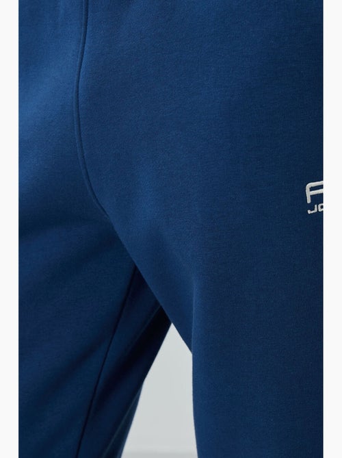 Conjunto de homem de sweatshirt e calças em felpa de algodão e poliéster tommy - Kiabi Conjunto de homem de sweatshirt e calças em felpa de algodão e poliéster tommy - Kiabi