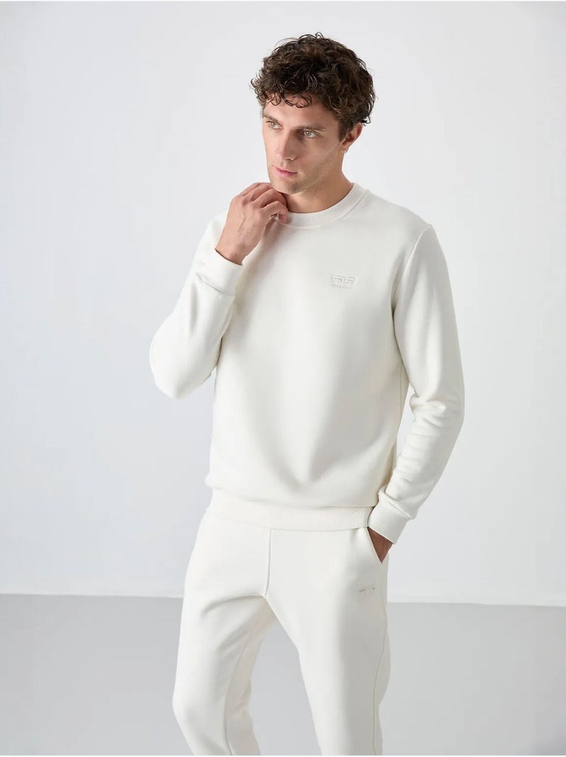 Conjunto de homem de sweatshirt e calças em felpa de algodão e poliéster tommy Branco sujo - Kiabi