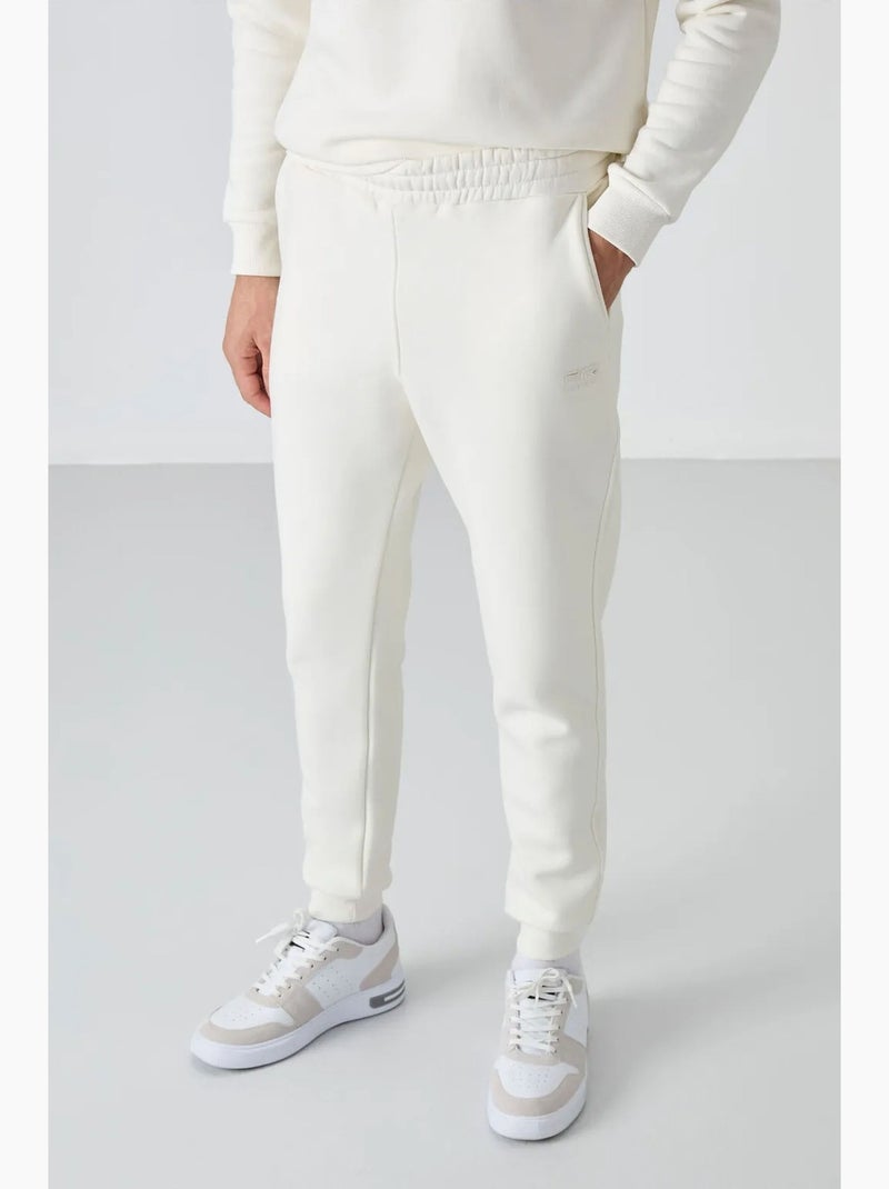 Conjunto de homem de sweatshirt e calças em felpa de algodão e poliéster tommy Branco sujo - Kiabi