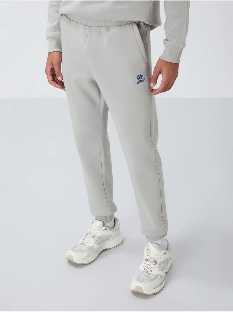 Conjunto de homem de sweatshirt e calças em felpa de algodão e poliéster tommy Cinza claro - Kiabi