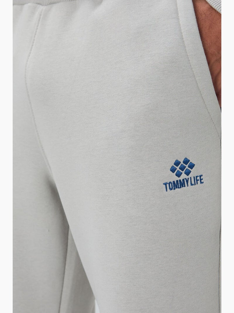 Conjunto de homem de sweatshirt e calças em felpa de algodão e poliéster tommy Cinza claro - Kiabi