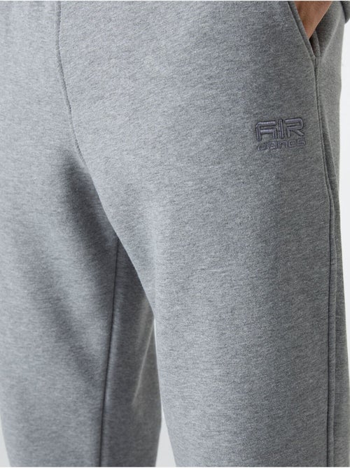 Conjunto de homem de sweatshirt e calças em felpa de algodão e poliéster tommy - Kiabi Conjunto de homem de sweatshirt e calças em felpa de algodão e poliéster tommy - Kiabi