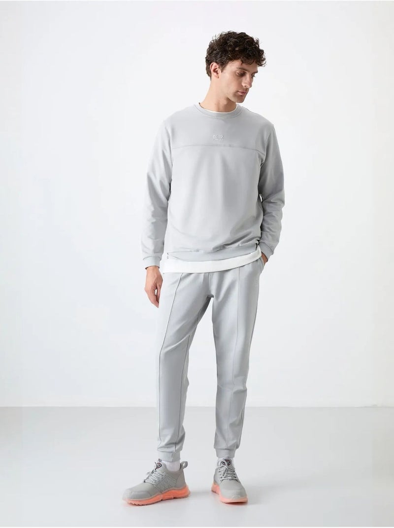 Conjunto de homem de sweatshirt em fleece e calças tommy Cinza claro - Kiabi