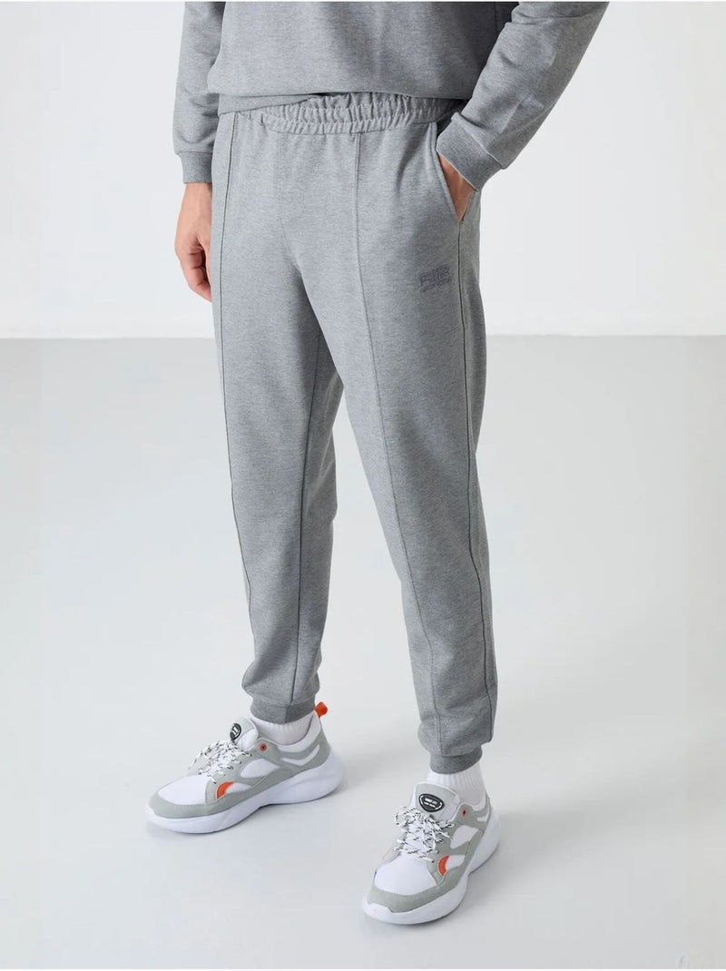 Conjunto de homem de sweatshirt em fleece e calças tommy Cinza - Kiabi