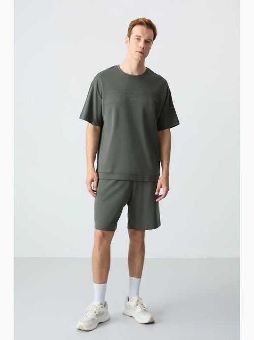 Conjunto de homem de t-shirt oversized e calções em mistura de algodão tommy - Kiabi Conjunto de homem de t-shirt oversized e calções em mistura de algodão tommy - Kiabi