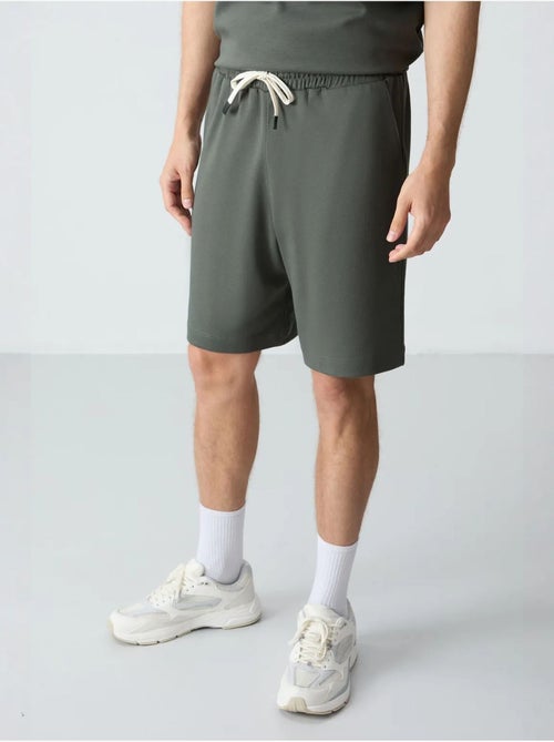 Conjunto de homem de t-shirt oversized e calções em mistura de algodão tommy - Kiabi Conjunto de homem de t-shirt oversized e calções em mistura de algodão tommy - Kiabi