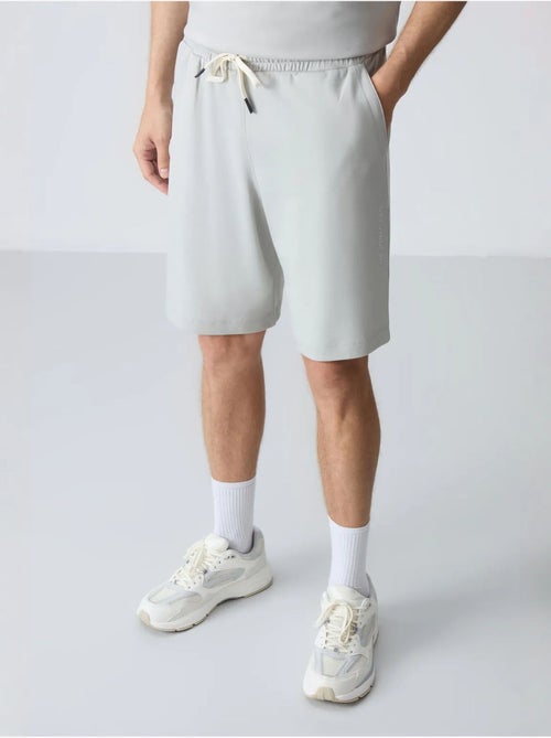 Conjunto de homem de t-shirt oversized e calções em mistura de algodão tommy - Kiabi Conjunto de homem de t-shirt oversized e calções em mistura de algodão tommy - Kiabi