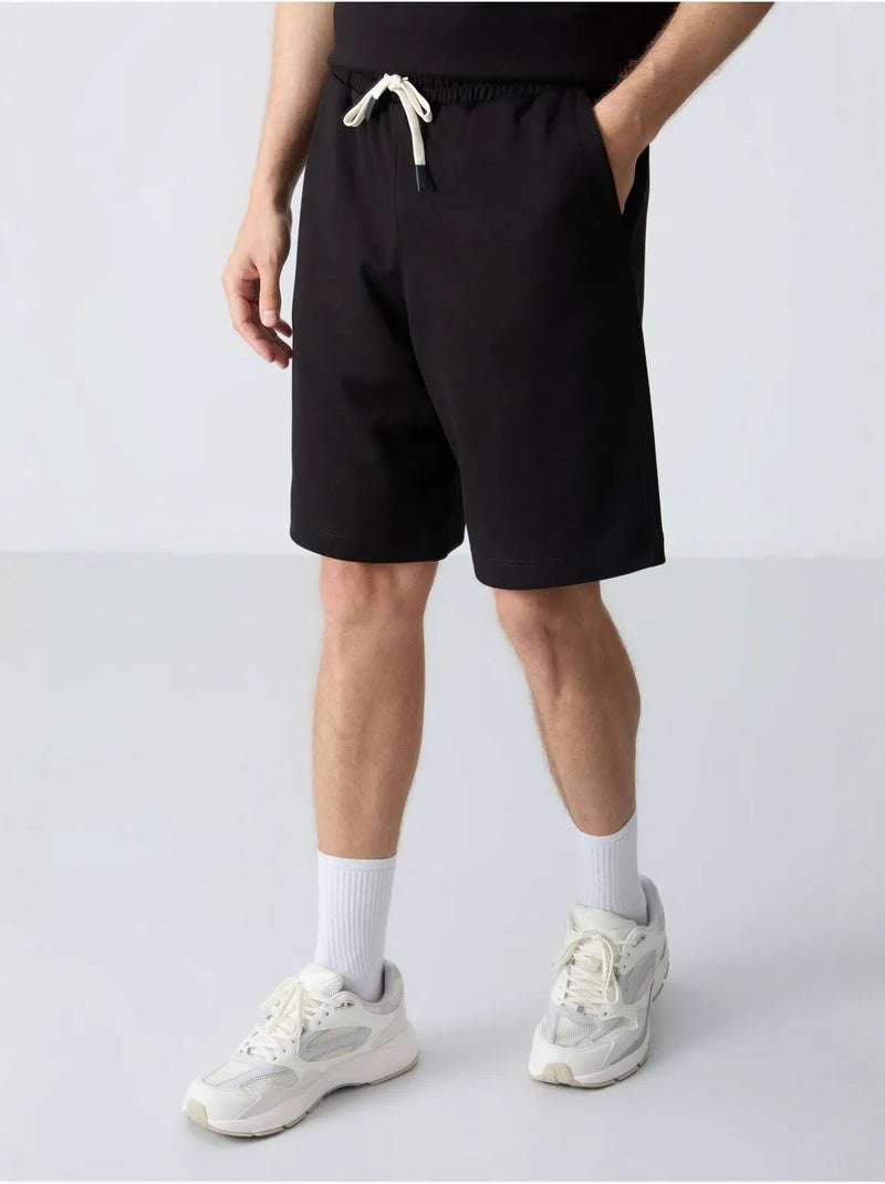 Conjunto de homem de t-shirt oversized e calções em mistura de algodão tommy Preto - Kiabi