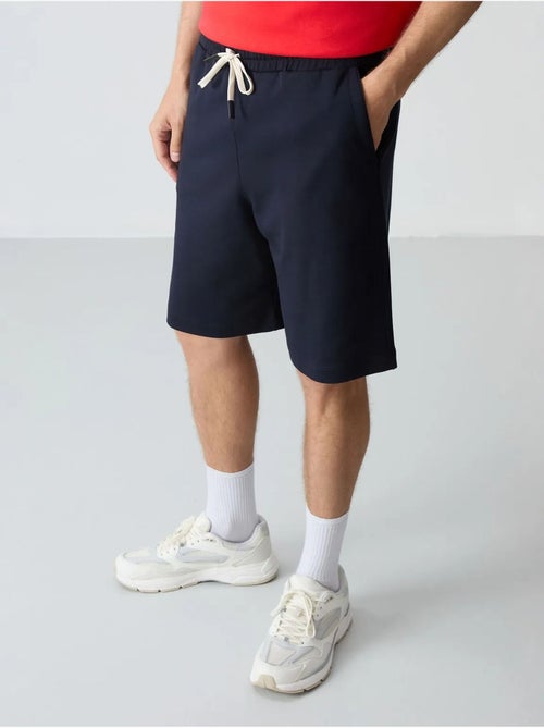 Conjunto de homem de t-shirt oversized e calções em mistura de algodão tommy - Kiabi Conjunto de homem de t-shirt oversized e calções em mistura de algodão tommy - Kiabi