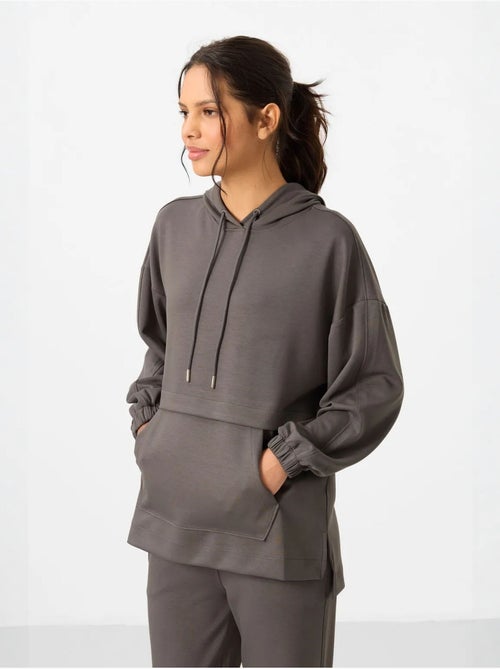 Conjunto de sweatshirt com capuz oversized e calças de perna larga tommy - Kiabi Conjunto de sweatshirt com capuz oversized e calças de perna larga tommy - Kiabi