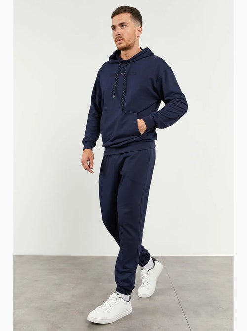 Conjunto de sweatshirt com capuz oversized e calças tommy - Kiabi Conjunto de sweatshirt com capuz oversized e calças tommy - Kiabi