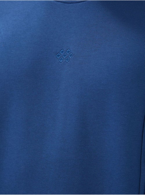 Conjunto de sweatshirt e calças em felpa de algodão e poliéster para homem tommy - Kiabi Conjunto de sweatshirt e calças em felpa de algodão e poliéster para homem tommy - Kiabi