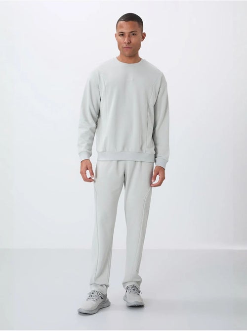 Conjunto de sweatshirt e calças em felpa de algodão e poliéster para homem tommy - Kiabi Conjunto de sweatshirt e calças em felpa de algodão e poliéster para homem tommy - Kiabi