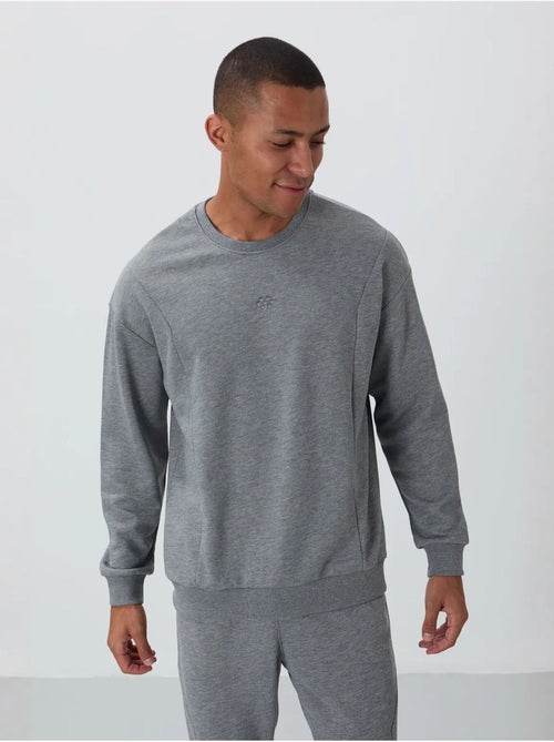 Conjunto de sweatshirt e calças em felpa de algodão e poliéster para homem tommy - Kiabi Conjunto de sweatshirt e calças em felpa de algodão e poliéster para homem tommy - Kiabi
