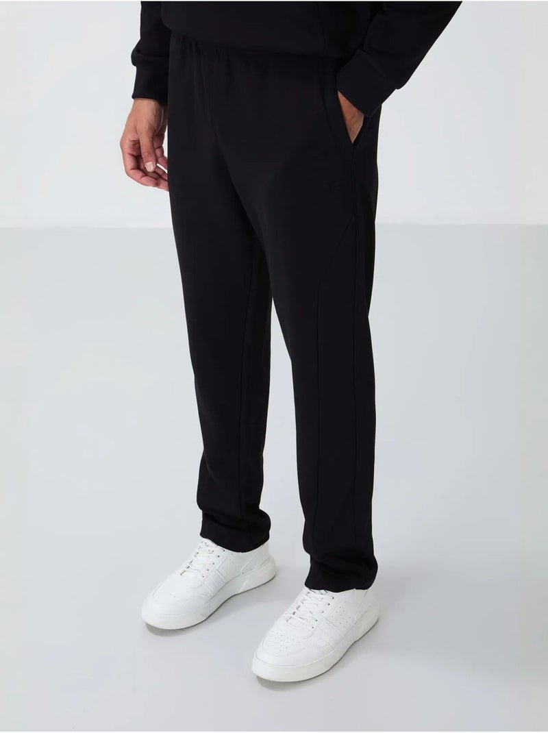 Conjunto de sweatshirt e calças em felpa de algodão e poliéster para homem tommy Preto - Kiabi
