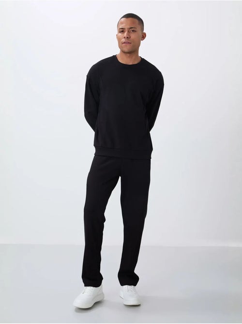 Conjunto de sweatshirt e calças em felpa de algodão e poliéster para homem tommy - Kiabi Conjunto de sweatshirt e calças em felpa de algodão e poliéster para homem tommy - Kiabi