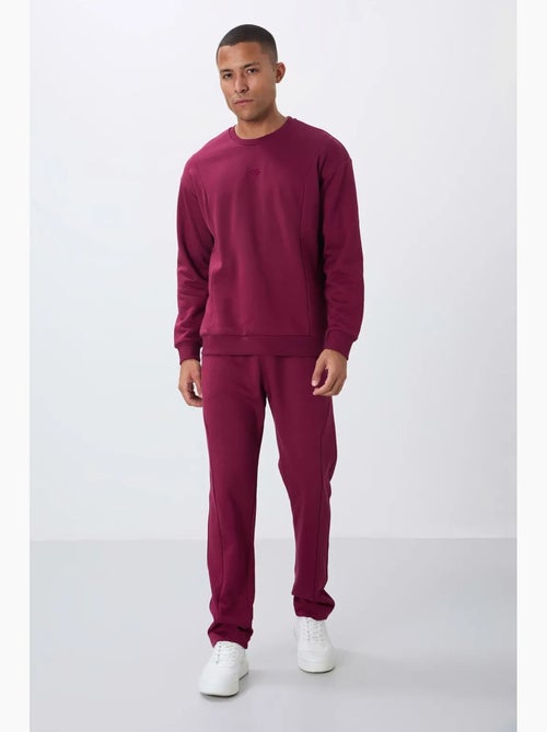 Conjunto de sweatshirt e calças em felpa de algodão e poliéster para homem tommy - Kiabi Conjunto de sweatshirt e calças em felpa de algodão e poliéster para homem tommy - Kiabi