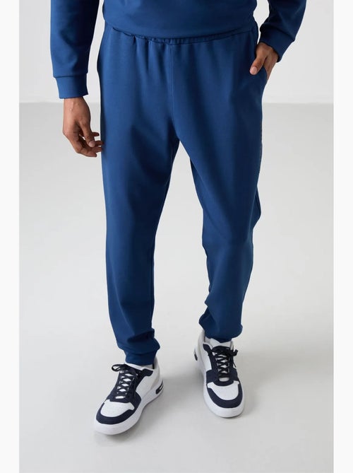 Conjunto de sweatshirt e calças em fleece estampado tommy - Kiabi Conjunto de sweatshirt e calças em fleece estampado tommy - Kiabi