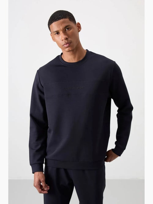 Conjunto de sweatshirt e calças em fleece estampado tommy - Kiabi Conjunto de sweatshirt e calças em fleece estampado tommy - Kiabi