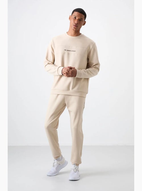 Conjunto de sweatshirt e calças em fleece estampado tommy - Kiabi Conjunto de sweatshirt e calças em fleece estampado tommy - Kiabi