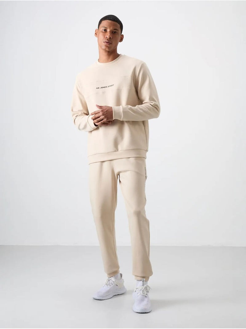 Conjunto de sweatshirt e calças em fleece estampado tommy Bege-argila - Kiabi