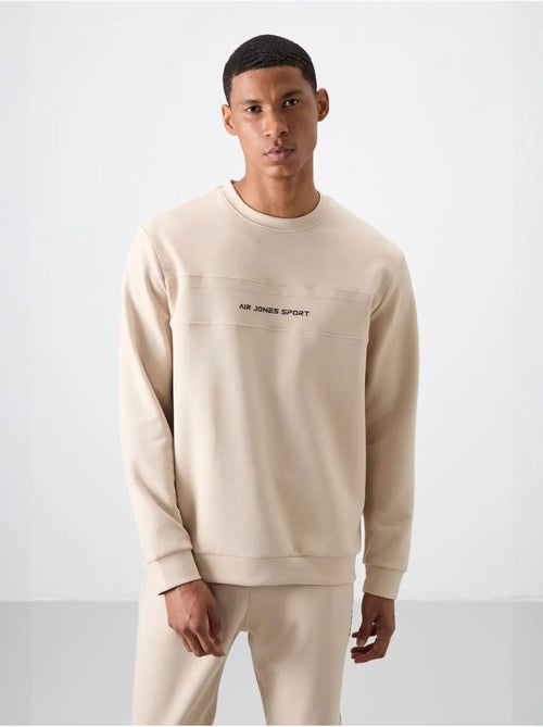 Conjunto de sweatshirt e calças em fleece estampado tommy - Kiabi Conjunto de sweatshirt e calças em fleece estampado tommy - Kiabi