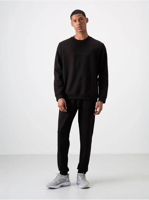 Conjunto de sweatshirt e calças em fleece estampado tommy - Kiabi Conjunto de sweatshirt e calças em fleece estampado tommy - Kiabi