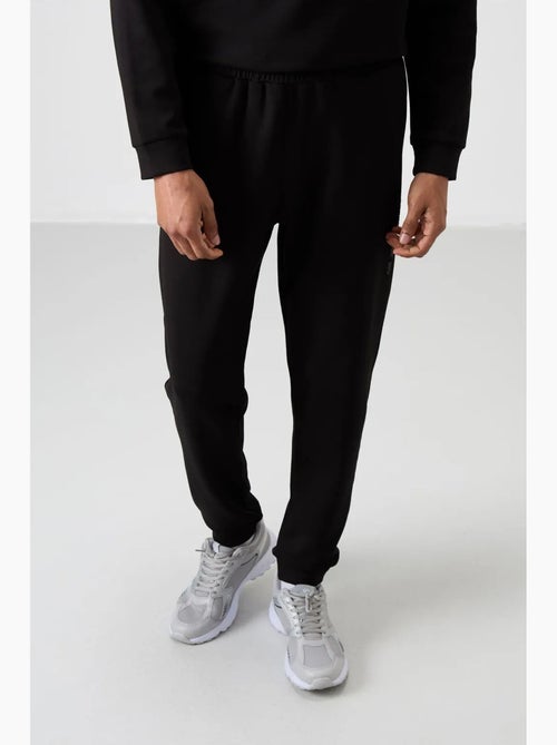 Conjunto de sweatshirt e calças em fleece estampado tommy - Kiabi Conjunto de sweatshirt e calças em fleece estampado tommy - Kiabi