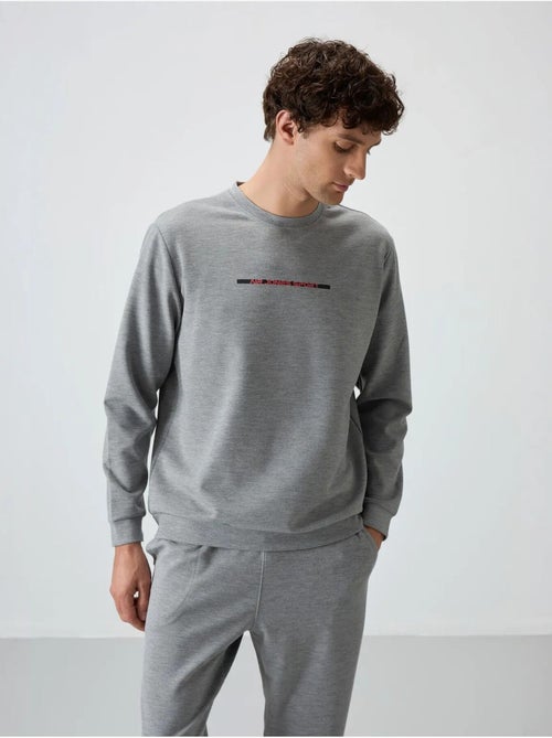 Conjunto de sweatshirt e calças em malha canelada para homem tommy - Kiabi Conjunto de sweatshirt e calças em malha canelada para homem tommy - Kiabi