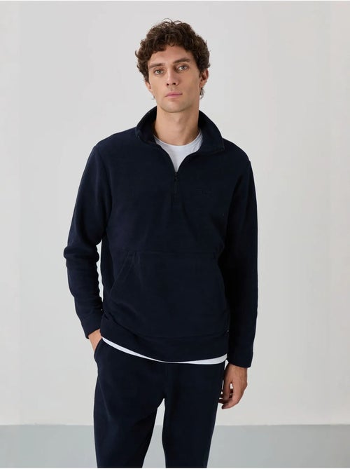 Conjunto de sweatshirt e calças em polar de poliéster para homem tommy - Kiabi Conjunto de sweatshirt e calças em polar de poliéster para homem tommy - Kiabi