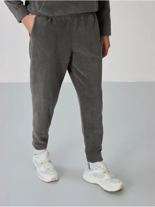 Conjunto de sweatshirt e calças em polar de poliéster para homem tommy - Kiabi Conjunto de sweatshirt e calças em polar de poliéster para homem tommy - Kiabi