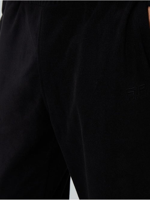 Conjunto de sweatshirt e calças em polar de poliéster para homem tommy - Kiabi Conjunto de sweatshirt e calças em polar de poliéster para homem tommy - Kiabi
