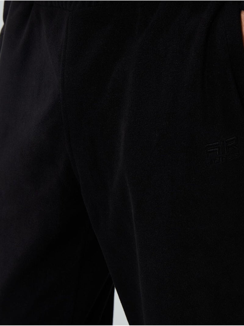Conjunto de sweatshirt e calças em polar de poliéster para homem tommy Preto - Kiabi