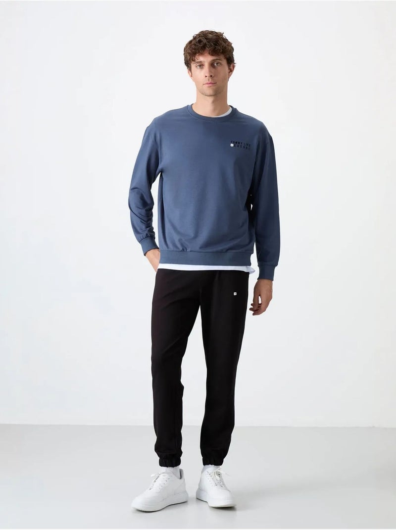 Conjunto de sweatshirt e calças oversize gola redonda tommy Azul - Kiabi