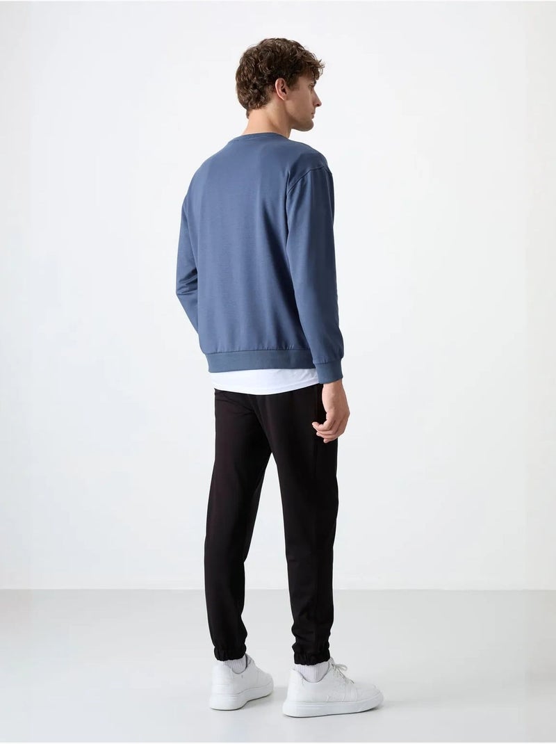 Conjunto de sweatshirt e calças oversize gola redonda tommy Azul - Kiabi