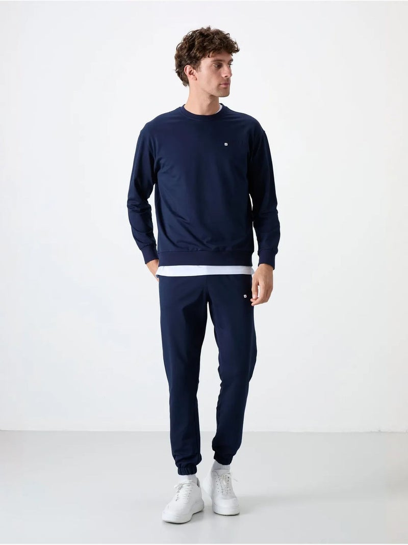 Conjunto de sweatshirt e calças oversize gola redonda tommy Azul-marinho - Kiabi