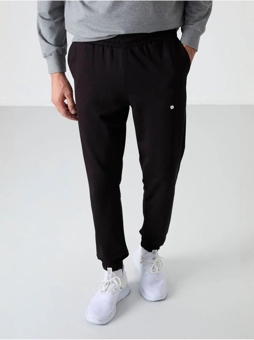 Conjunto de sweatshirt e calças oversize gola redonda tommy - Kiabi Conjunto de sweatshirt e calças oversize gola redonda tommy - Kiabi