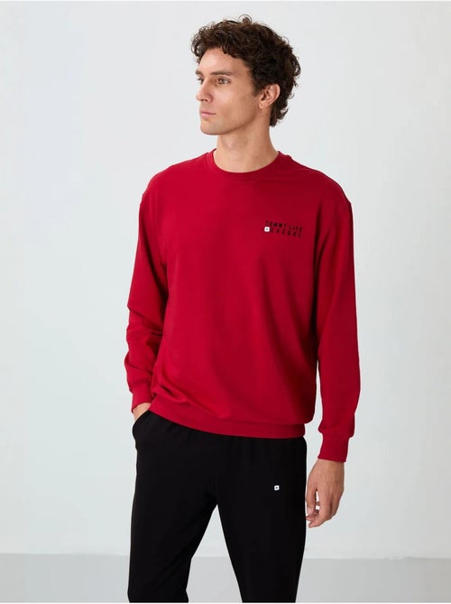 Conjunto de sweatshirt e calças oversize gola redonda tommy - Kiabi Conjunto de sweatshirt e calças oversize gola redonda tommy - Kiabi