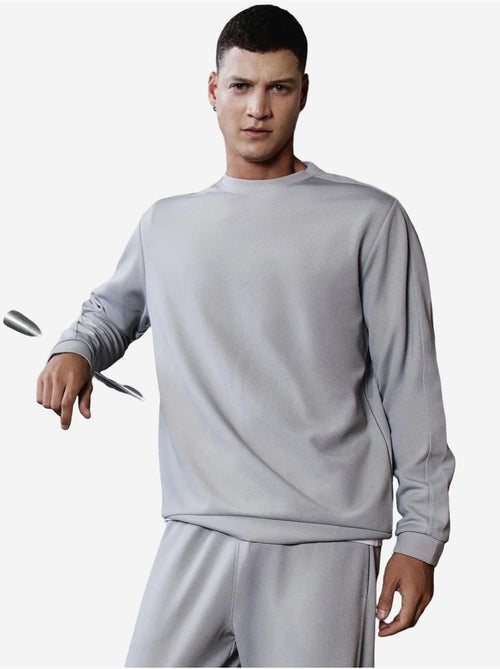 Conjunto de sweatshirt oversized e calças de homem tommy - Kiabi Conjunto de sweatshirt oversized e calças de homem tommy - Kiabi