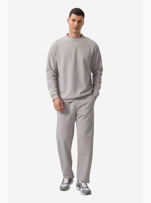Conjunto de sweatshirt oversized e calças de homem tommy - Kiabi Conjunto de sweatshirt oversized e calças de homem tommy - Kiabi