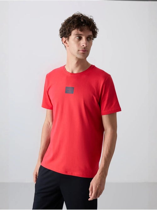 Conjunto de t-shirt e calções em jersey de algodão estampado tommy - Kiabi Conjunto de t-shirt e calções em jersey de algodão estampado tommy - Kiabi