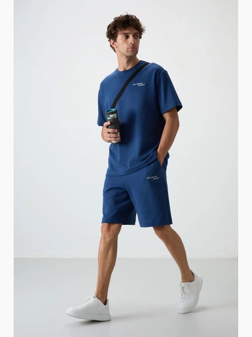 Conjunto de t-shirt oversized de manga curta e calções tommy - Kiabi Conjunto de t-shirt oversized de manga curta e calções tommy - Kiabi