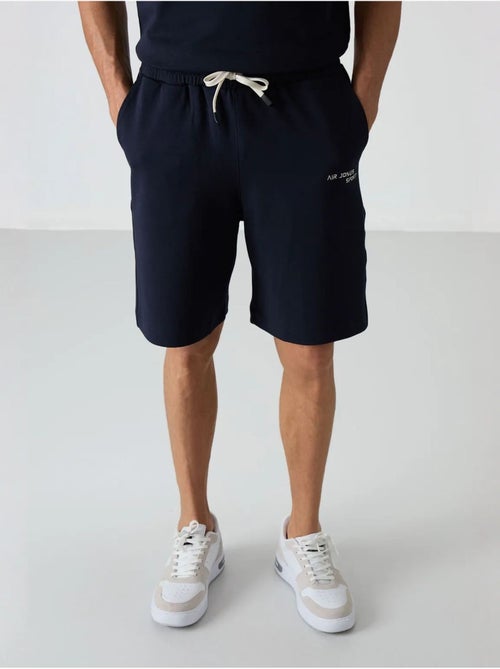 Conjunto de t-shirt oversized de manga curta e calções tommy - Kiabi Conjunto de t-shirt oversized de manga curta e calções tommy - Kiabi
