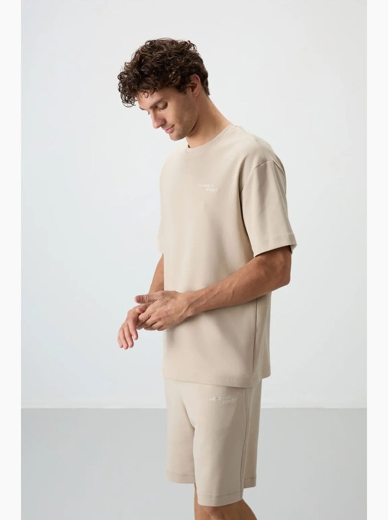 Conjunto de t-shirt oversized de manga curta e calções tommy Bege-argila - Kiabi