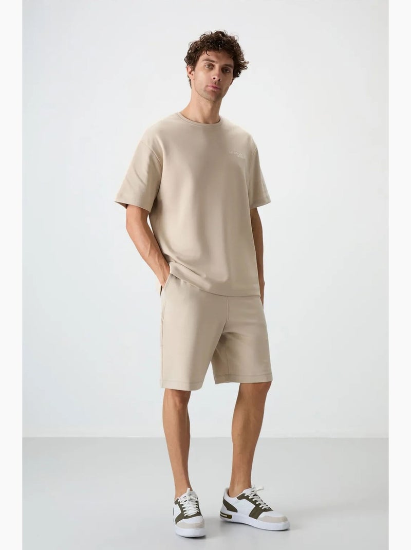 Conjunto de t-shirt oversized de manga curta e calções tommy Bege-argila - Kiabi